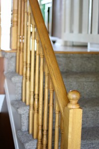Stairway with wooden railing