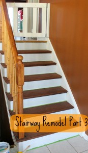 Wooden stairway with railing and sign