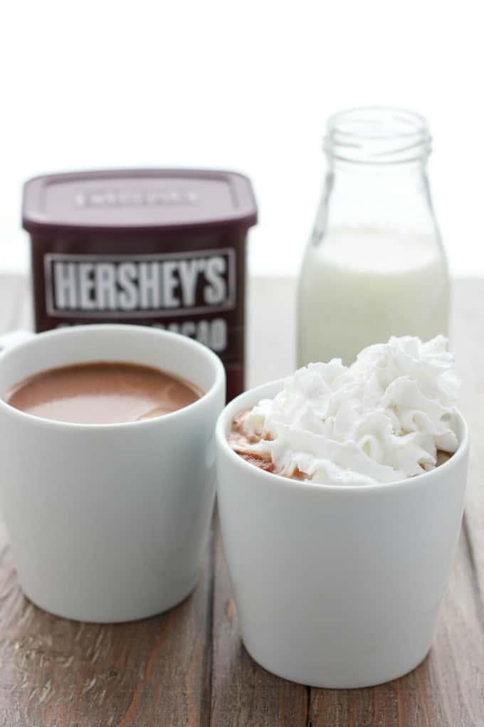 Homemade Hot Cocoa  beverage in white cups wih milk and cocoa on table(for two!) #beverage