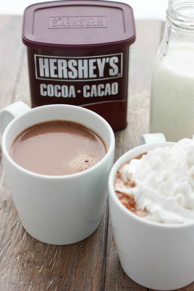 Homemade Hot Cocoa beverage in white cups  near cacaoe on table(for two!) #winter