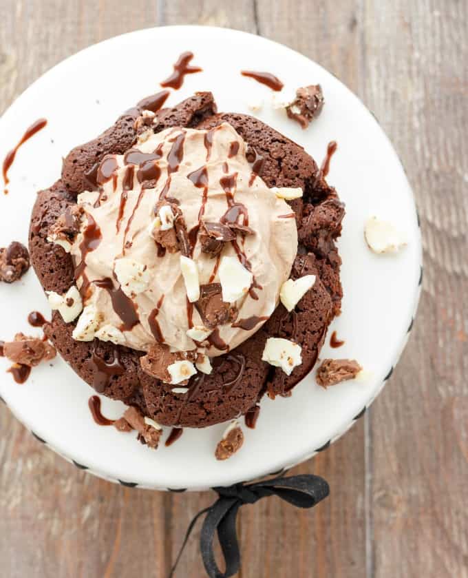 Gluten-Free Double Chocolate Torte with Chocolate Mousse  on white stray, on brown table#mousse