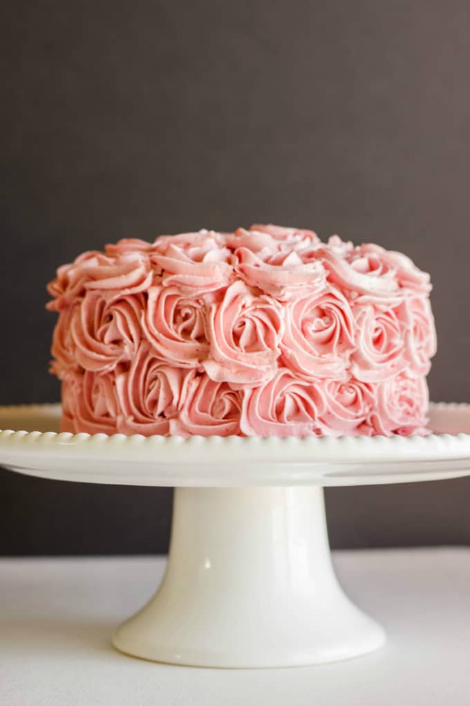 Raspberry Swiss Meringue Buttercream cake on white fancy stray