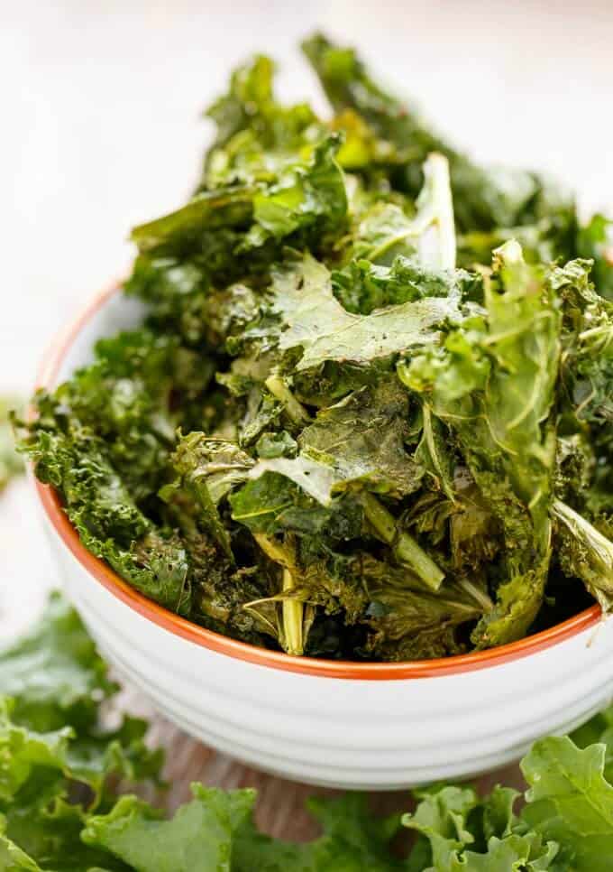 Coconut Oil Kale Chips in white bowl#vegan