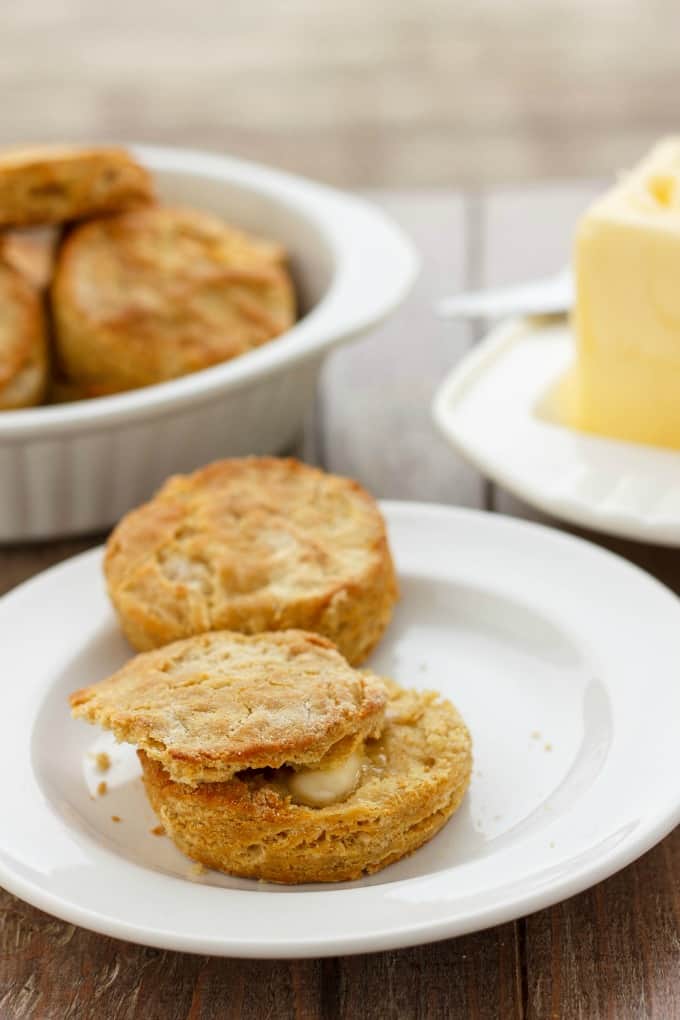 Gluten-Free Biscuits made with Robin Hood Nutri Flour Blend on white plate with cheese inbetween#butter