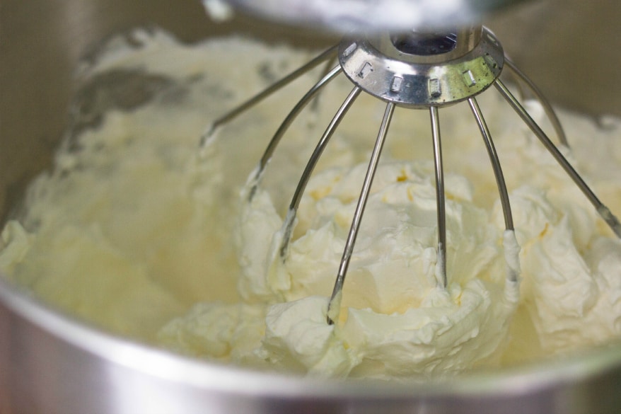 Meringue buttercream mixed in bowl