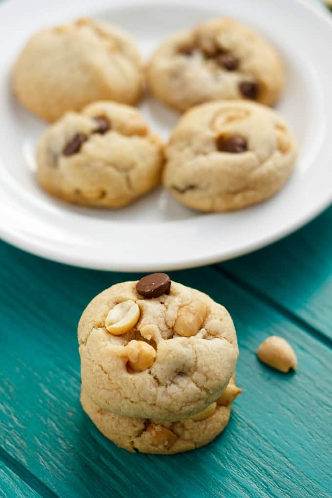 No Butter Chocolate Chip Cookies with Peanuts on white plate on blue table#cookies