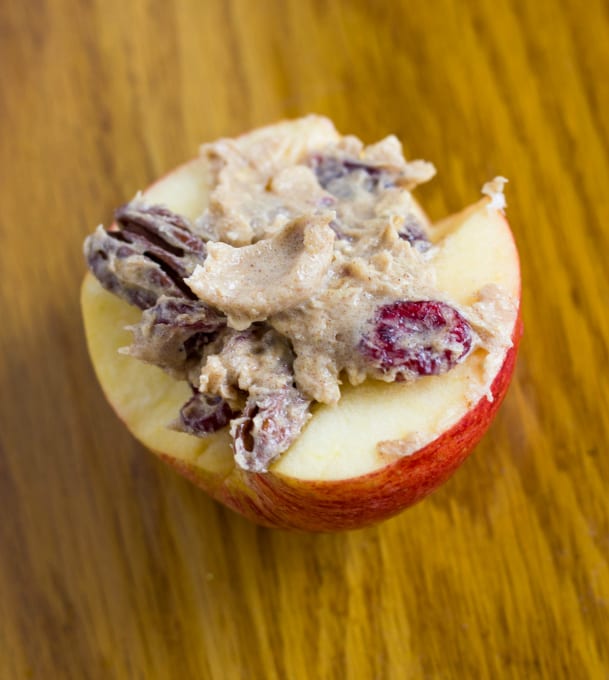 Baked Campfire Apple cutted in half on brown table