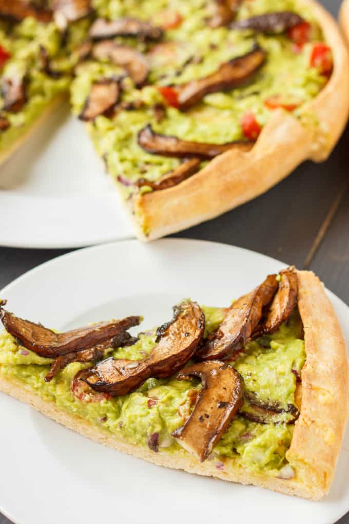 Vegan Guacamole Pizza  on white plates