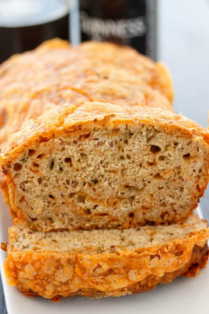 Cheese and Dill Beer Bread slices on white plate