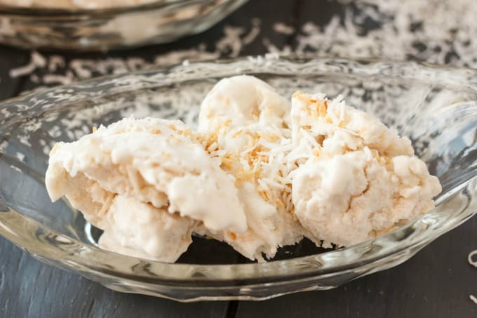 Vegan Toasted Coconut Ice Cream on glass tray on gray table