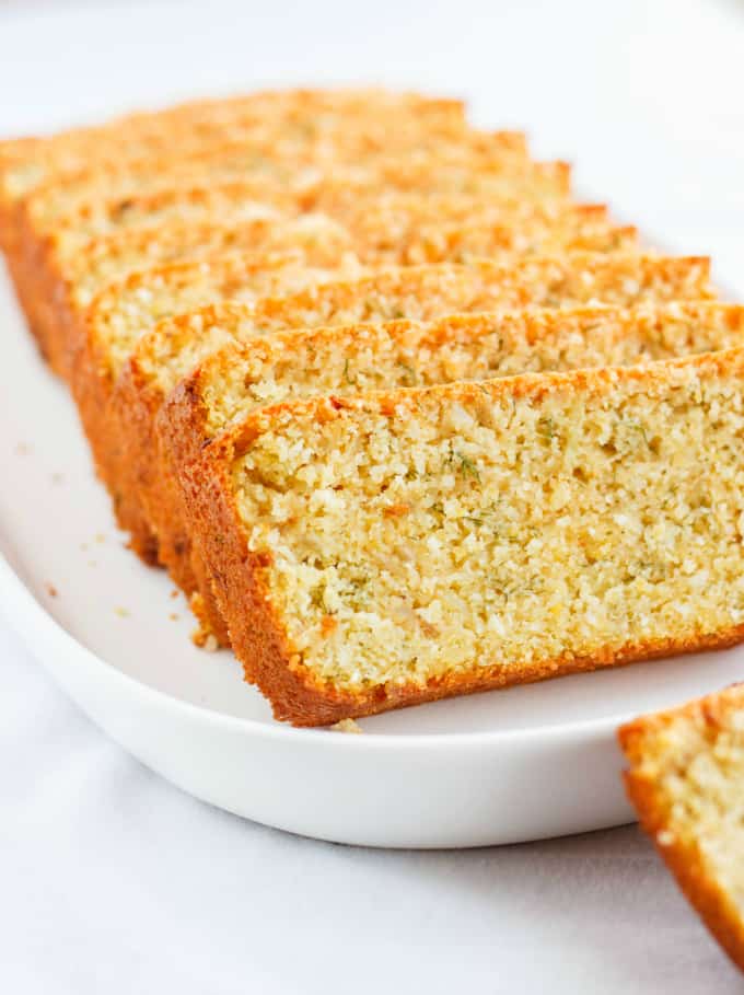 Beer and Parmesan Bread slices  made with Lentil Flour on white plate on white table