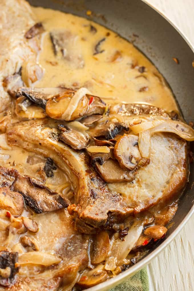 Pork Loin Chops in a Creamy Mushroom Sauce in pan