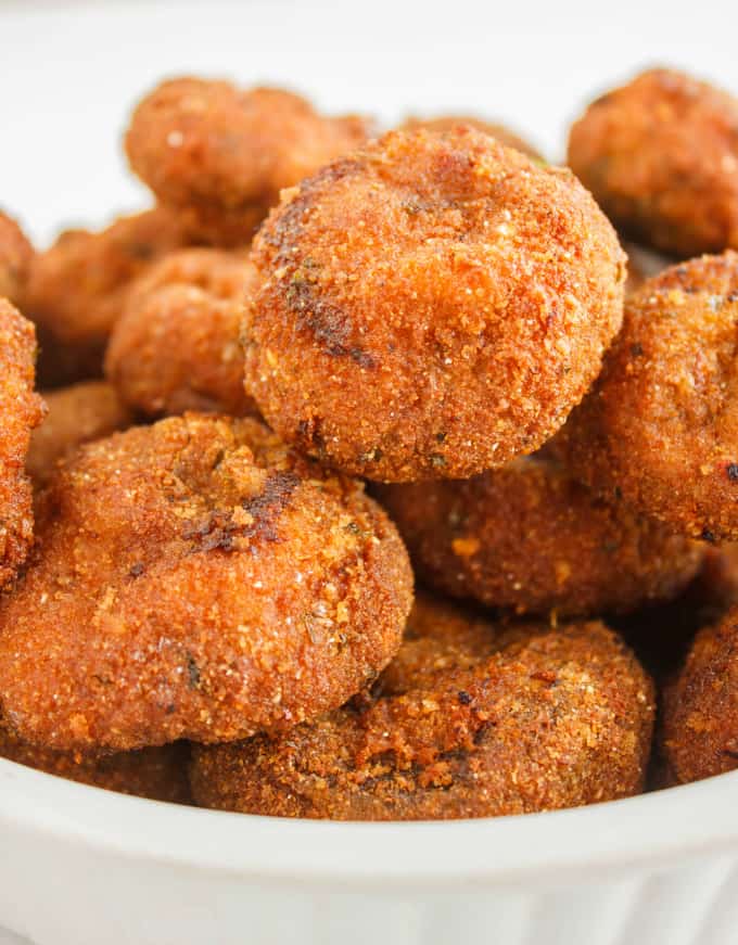 Crispy Deep-Fried Breaded Mushrooms in white bowl