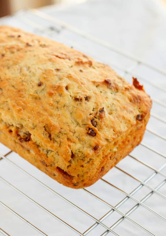 Beer, Bacon, and Parmesan loaf of bread on baking grid