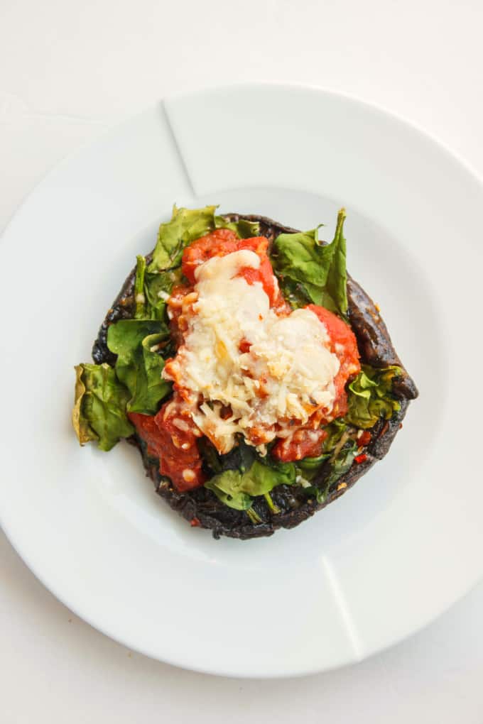 Portobello Mushroom Pizza on white plate on white table