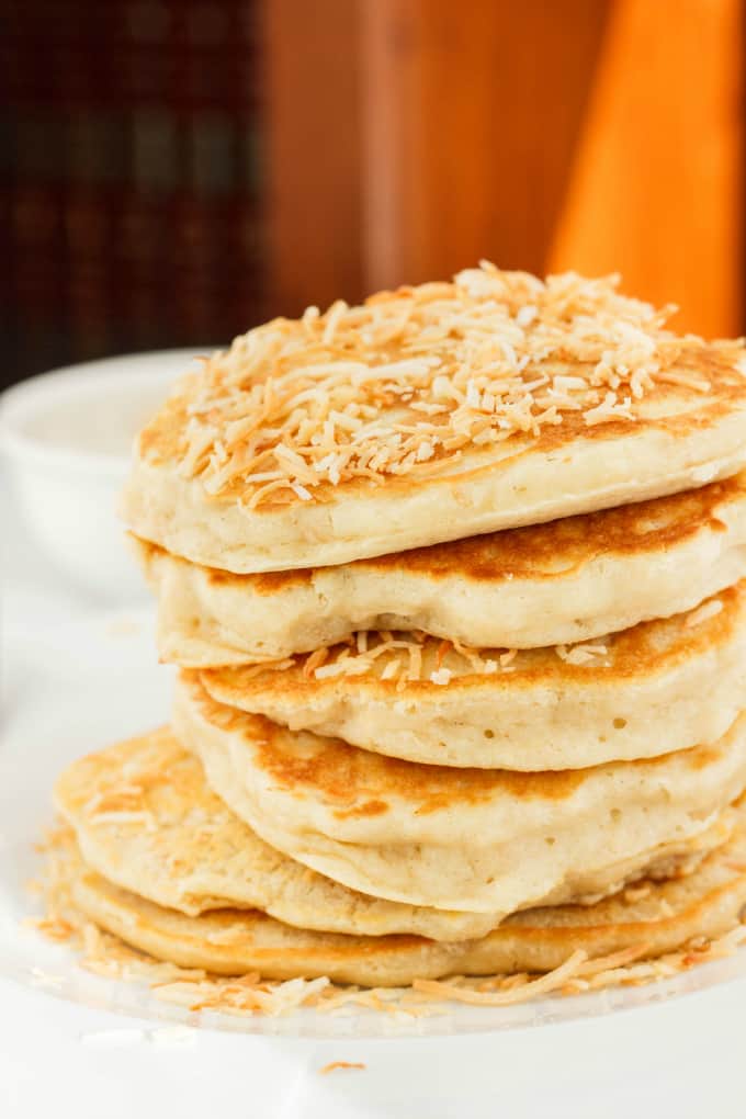 Toasted Coconut Pancakes on white plate