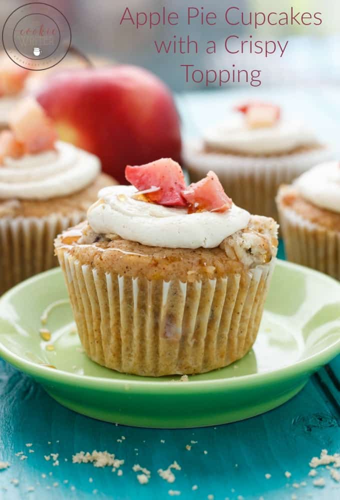 Apple pie cupcake on green plate on blue table, Cupcakes and red apple in the background