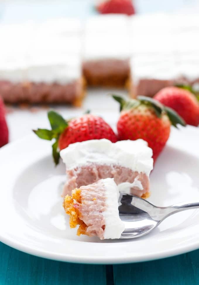 Easy Strawberry Square on white plate with spoon with ripe strawberries on blue table #easter