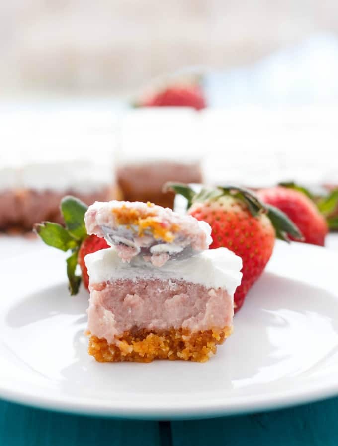 Easy Strawberry Square on white plate with spoon and ripe strawberries on blue table #strawberry