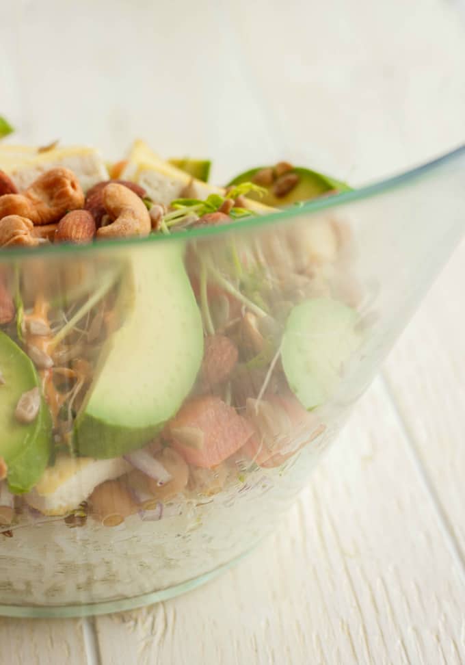 Fresh Powerhouse  in glass Bowl with veggies, fruits, bread and nuts