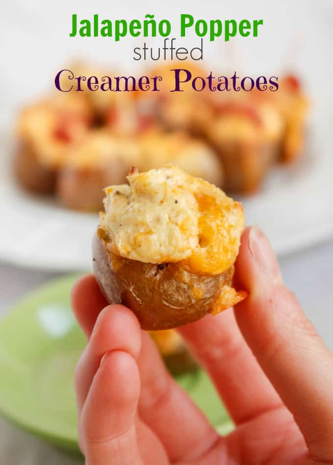 Jalapeno Popper Stuffed Creamer Potatoe held by hand