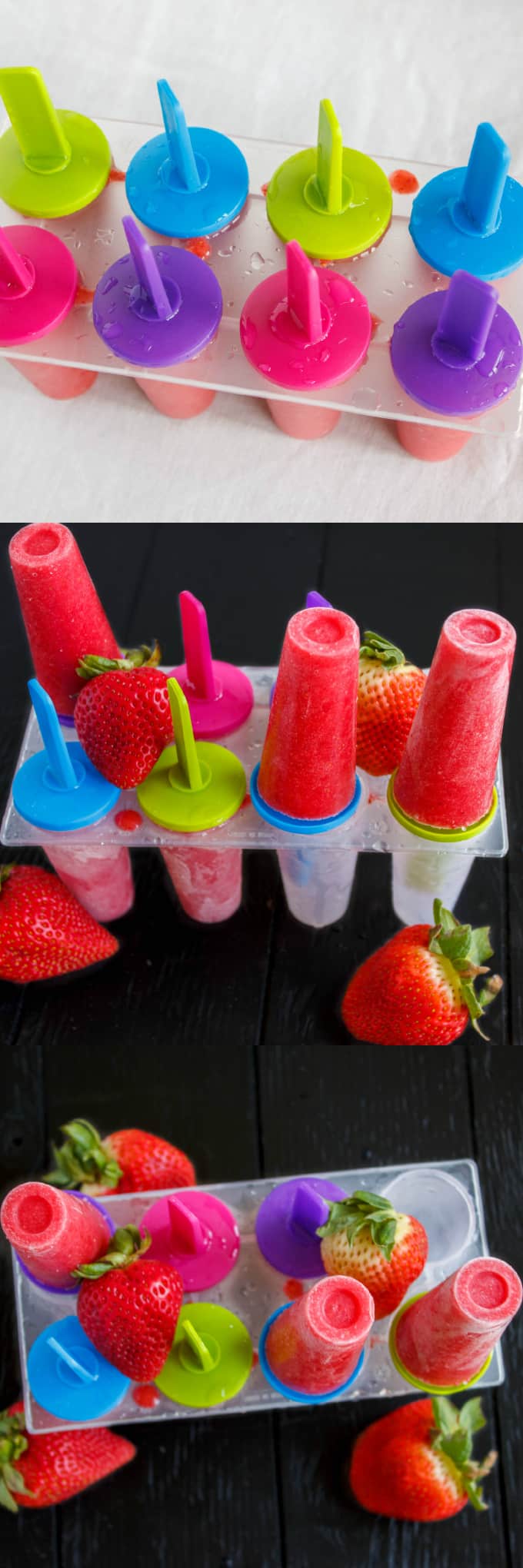 Strawberry Sorbet Popsicles in plastic form with ripe strawberries on white and black table