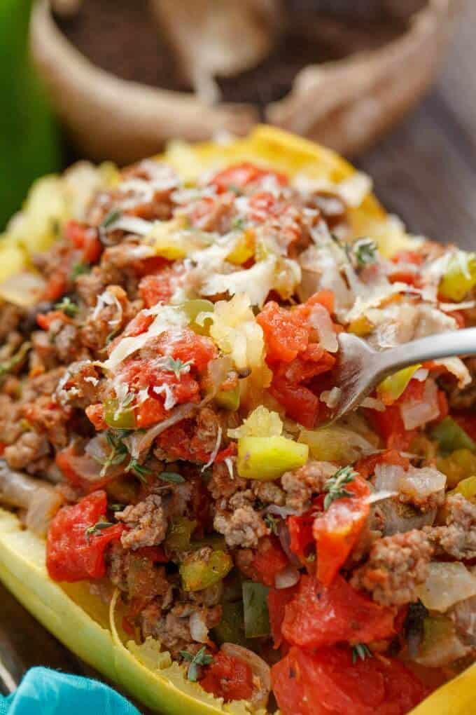 Stuffed Spaghetti Squash with Tomato and Ground Beef picked by fork