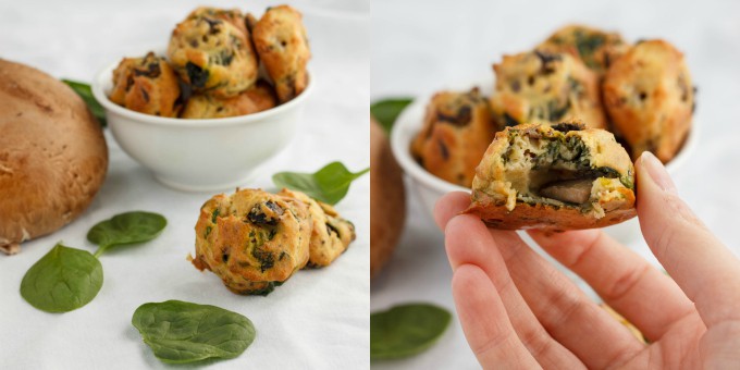 Mushroom and Spinach Puffs  on table with spinach spilled around, bowl of puffs in the background, Bitten puff held by hand, bowl of puffs in the background