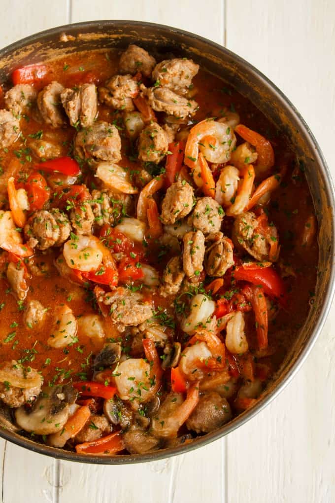 Shrimp and Sausage Pasta Sauce in pan on white table