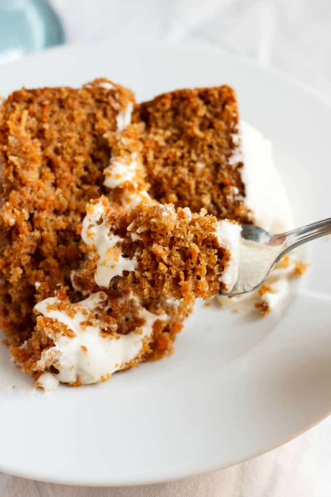 Gluten-Free Carrot Cake with Robin Hood Nutri Flour Blend on white plate picked by fork