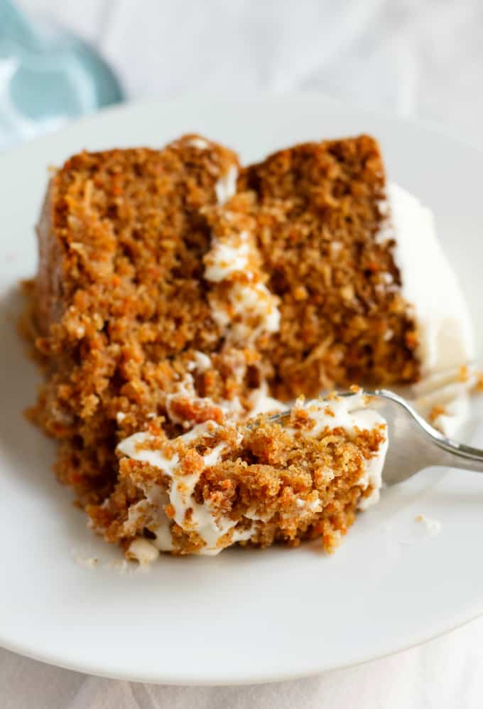 Gluten-Free Carrot Cake with Robin Hood Nutri Flour Blend on white plate picked by fork