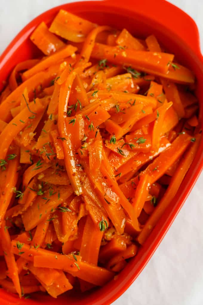 Honey-Glazed Carrots with Fresh Thyme in red container