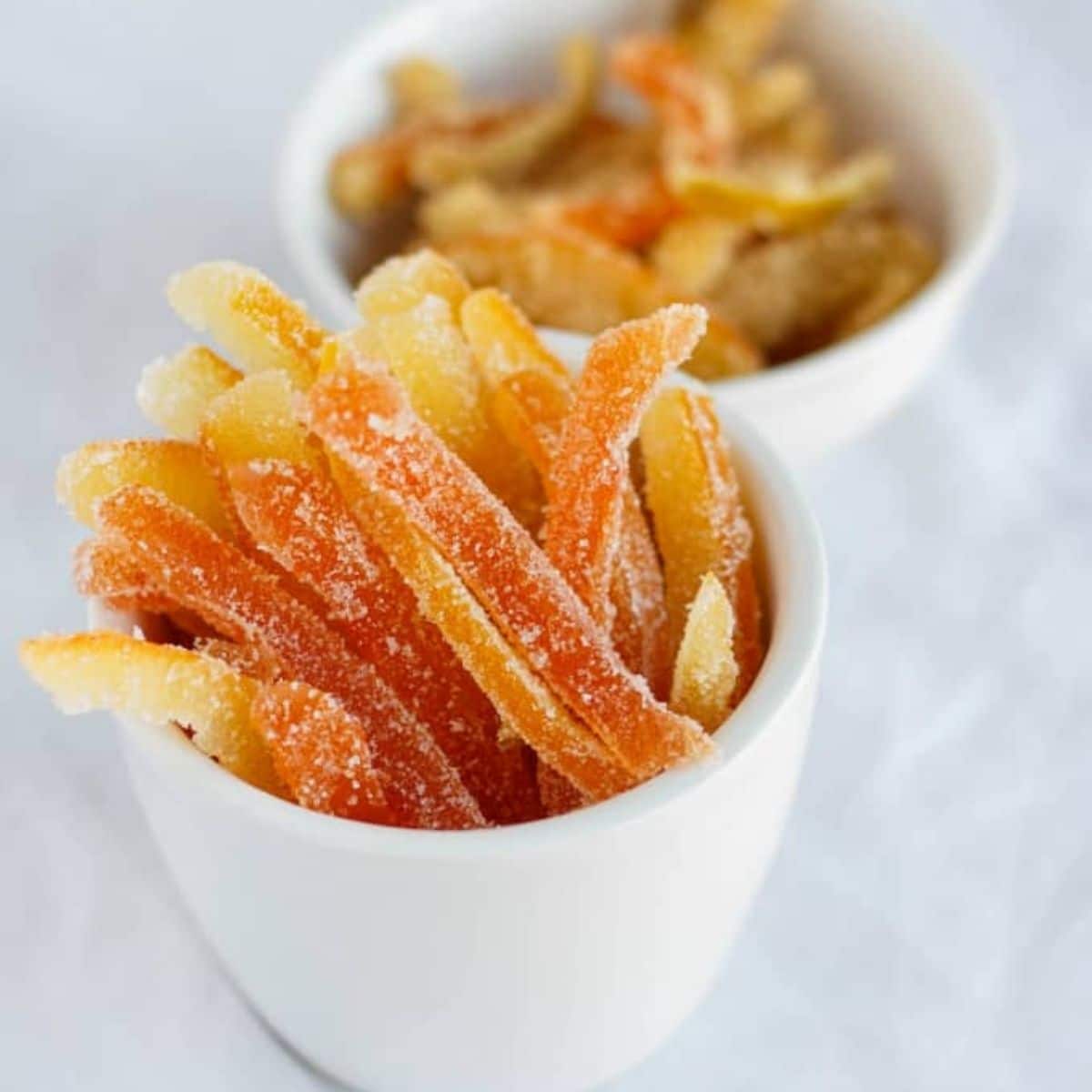 https://thecookiewriter.com/wp-content/uploads/2015/11/homemade-candied-citrus-peels-featured.jpg