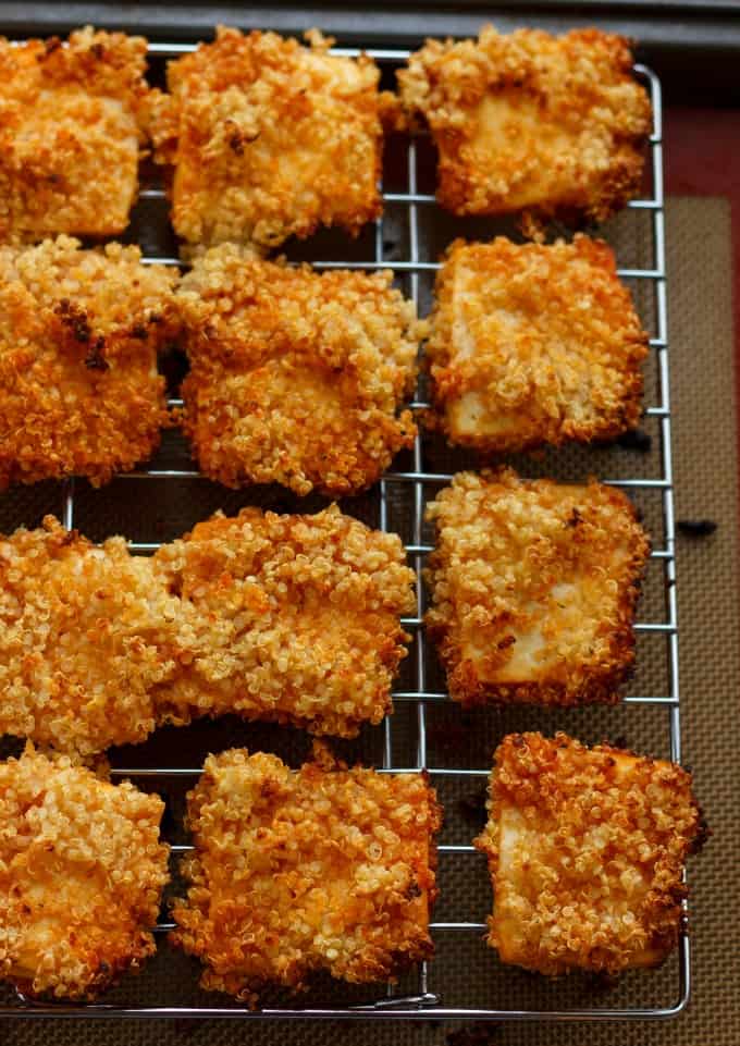 Quinoa crusted tofu nuggets on baking grid