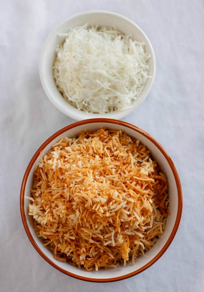 Toasted  Coconut  in orange bowl, non toasted coconut in white bowl