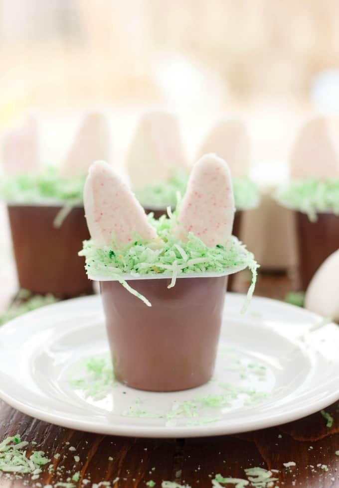 Marshmallow Bunny Ear Pudding Cup white plate, rest of cups in the background#glutenfree