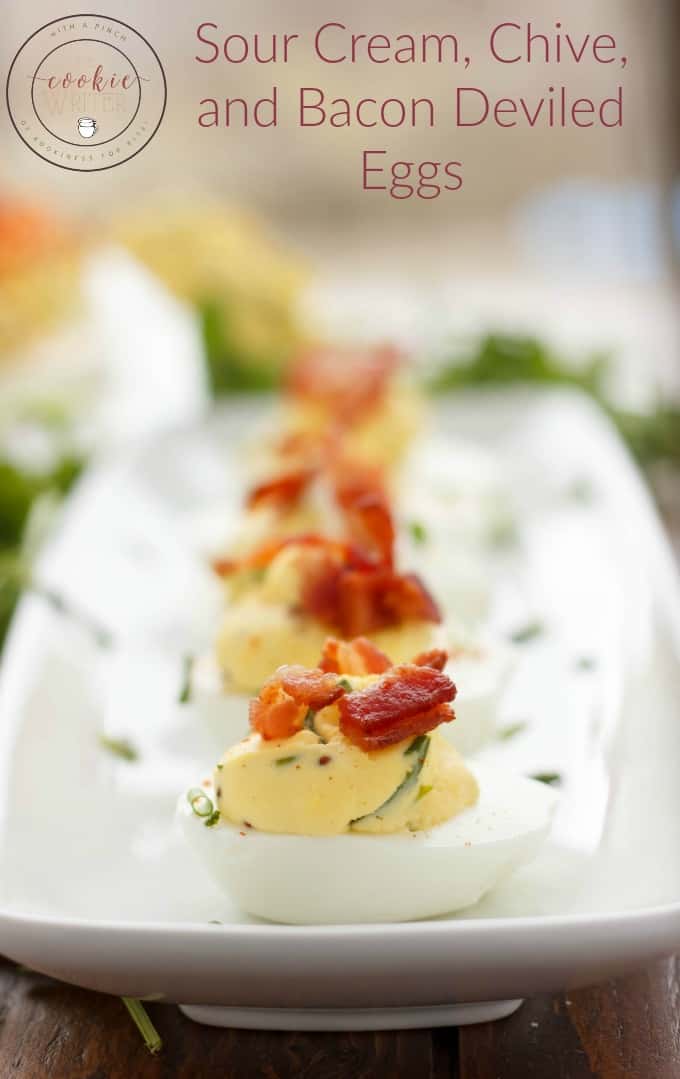 Sour Cream, Chive, and Bacon Deviled Eggs on white tray