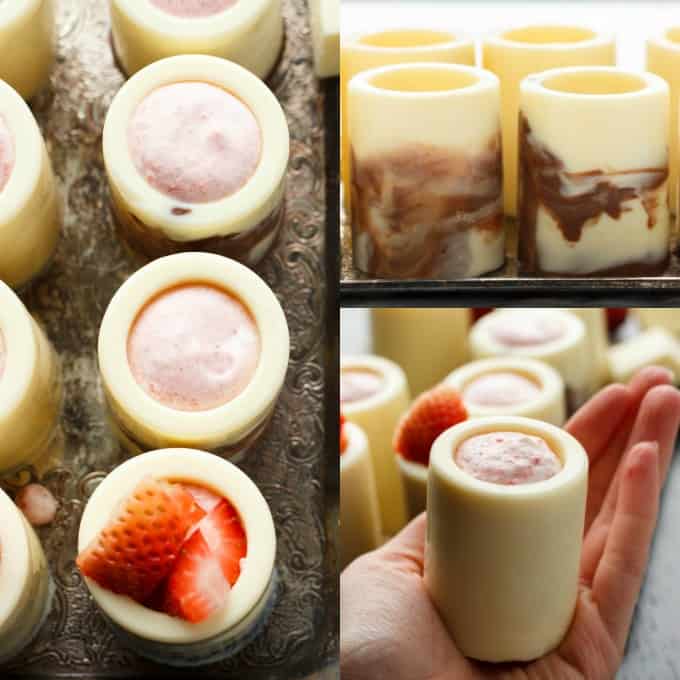 White Chocolate Shot Glasses with Strawberry Mousse on brown tray , one shot held by hand #strawberry