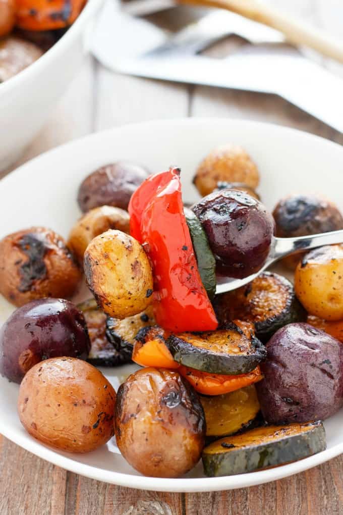 BBQ Potatoes and Vegetable Medley on white plate with fork #glutenfree