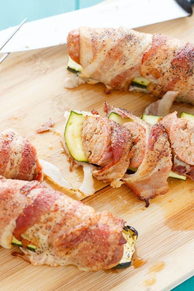 Bacon Wrapped Sausage and Zucchini  on wooden pad #pork