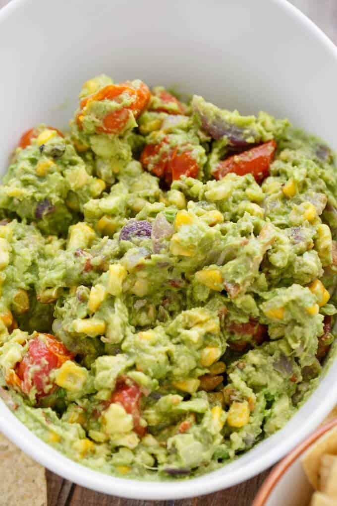 Roasted Guacamole with Bacon in white bowl