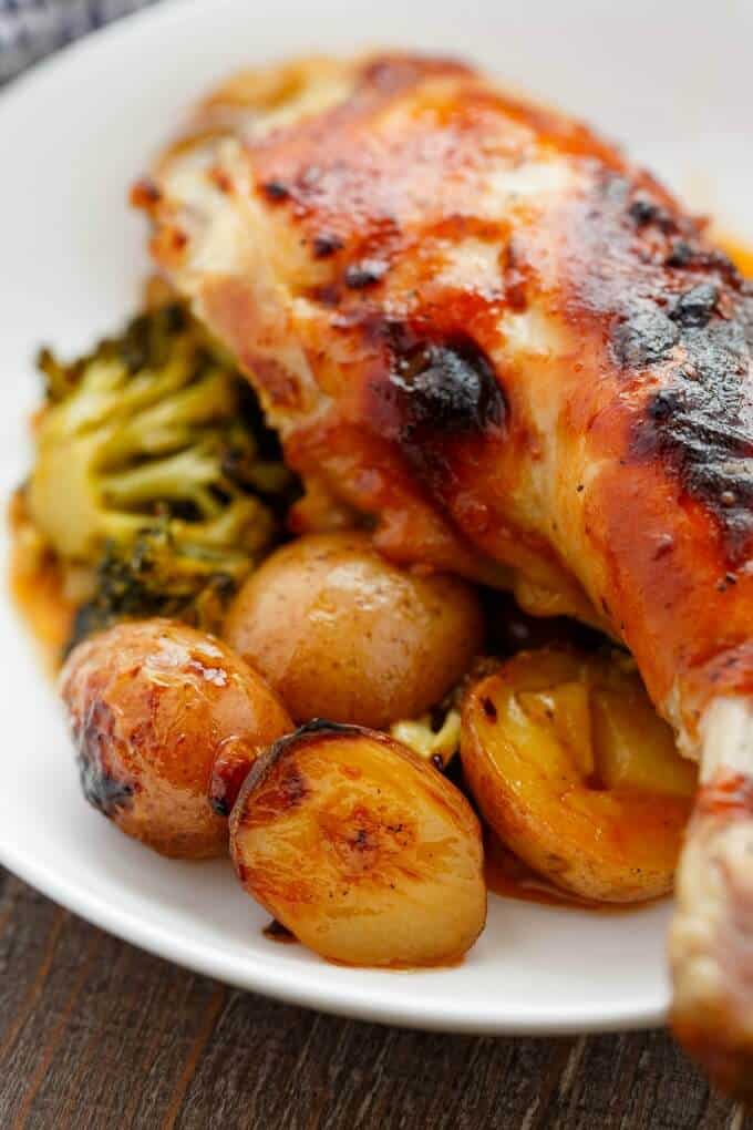 General Tso's Potatoes and Chicken on white plate on wooden table#creamerpotatoes