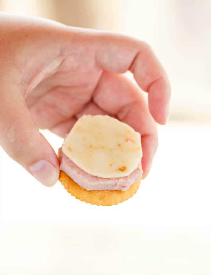 Homemade Lunchables with Ham held by hand
