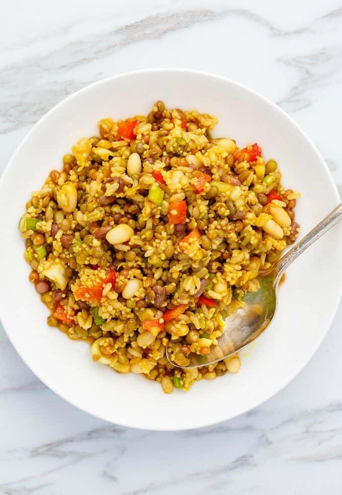 Summer Fresh Seven Grain Salad on white plate with spoon