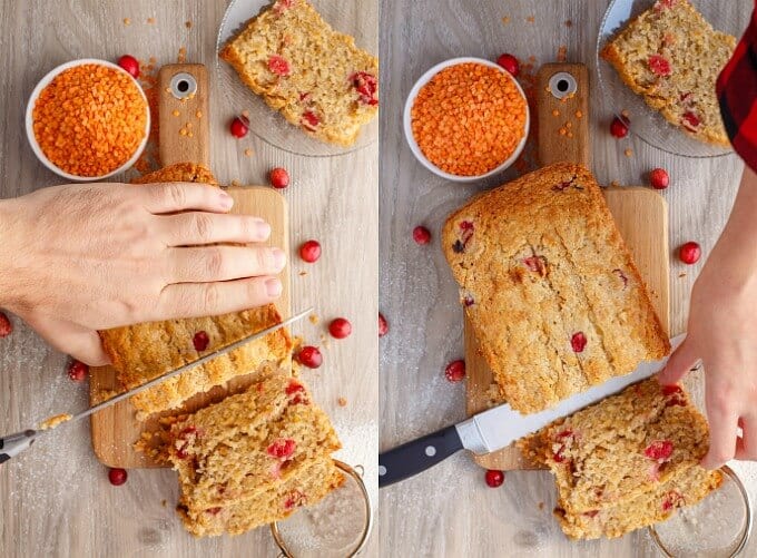 Cranberry Lentil Bread sliced by knife on wooden pad, cranberries and lentils in bowl on the table