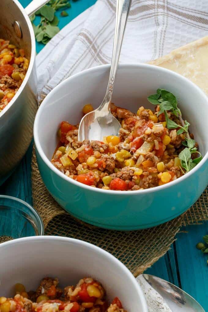 Split Pea Lentil Casserole in blue bowl with spoon