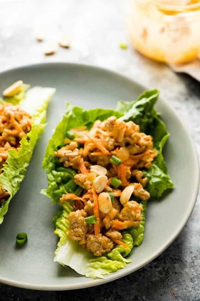 Thai turkey meal prep lettuce warps on gray plate