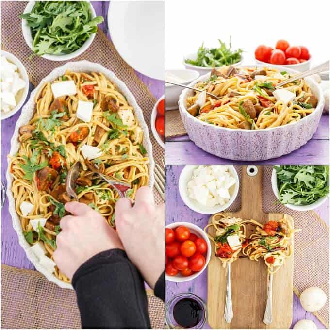 Roasted Mushroom Caprese Pasta in bowl being mixed by forks next to bowls full of ingredients. Spoons full of same dish on wooden  pad