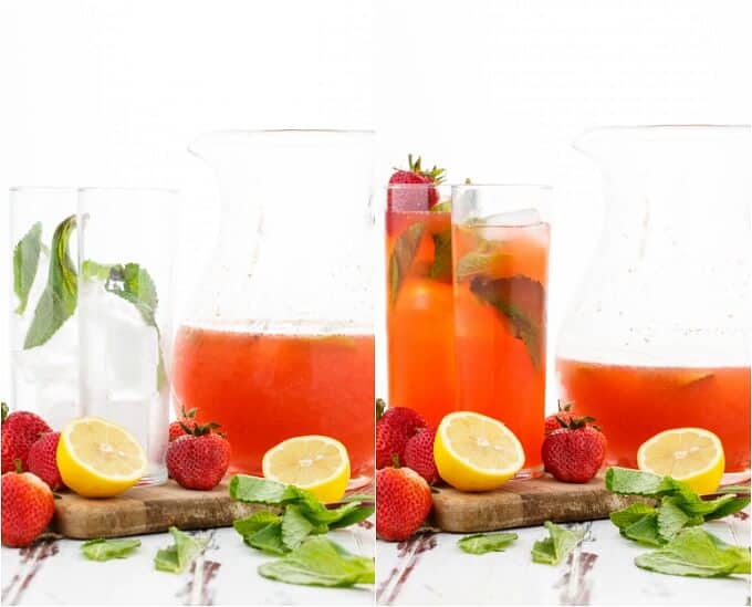 Homemade Strawberry Lemonade in glass cups and glass pitcher on wooden pad. Lemons, herbs and ripe strawberries on the table