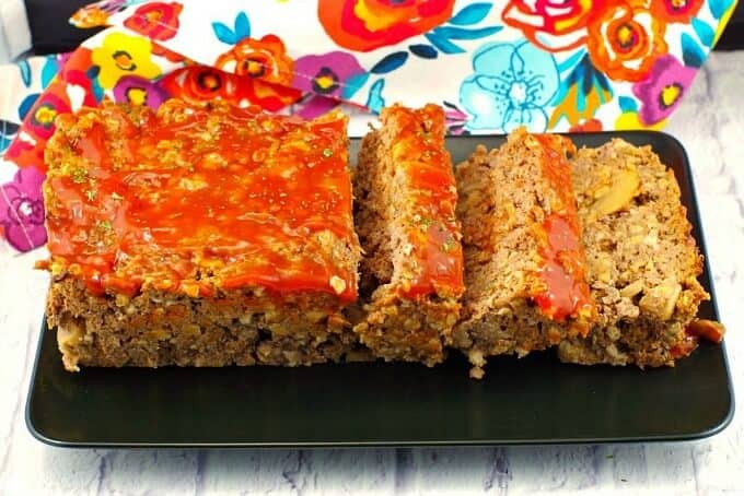 Dairy free and gluten free meatloaf on black tray